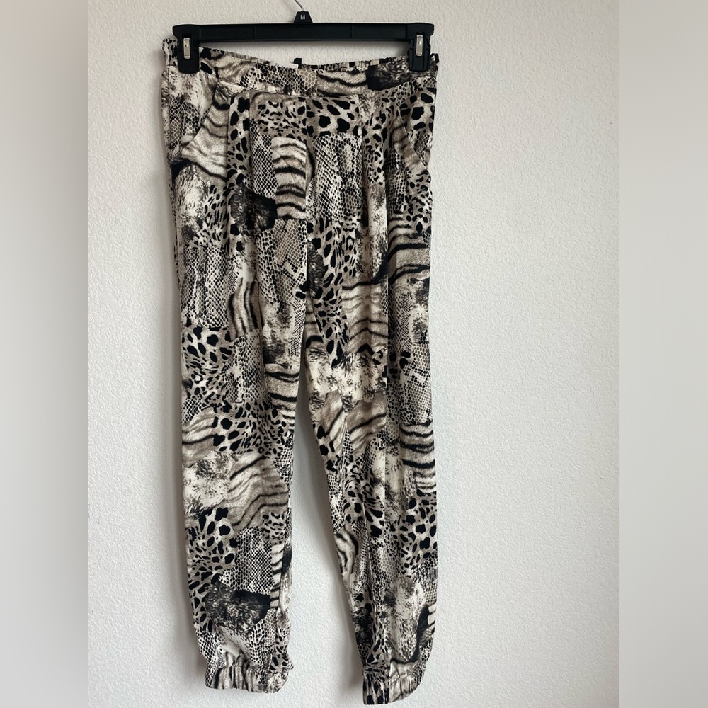 Leporad and snake print casual pants in great condition. Great with sandals.